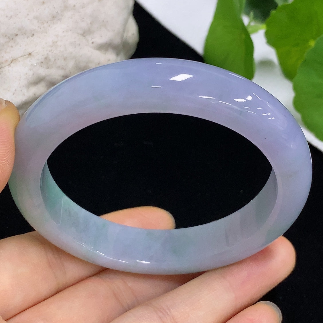 HKHQ jadeite round bangle, size 54.5, 57g, showcasing smooth polished green jadeite bracelet on white background