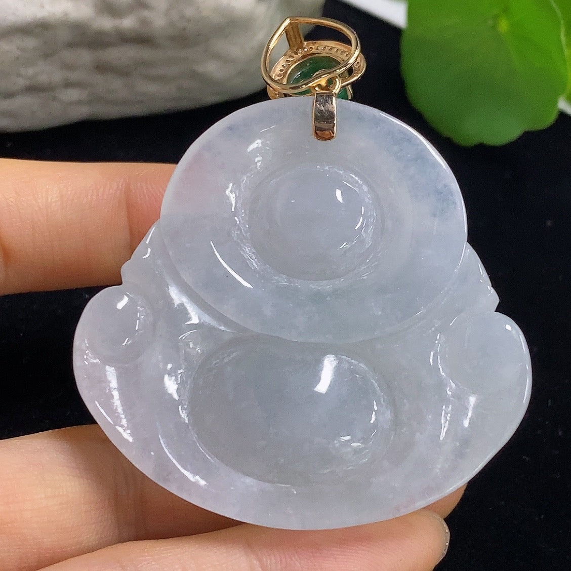Jadeite Buddha pendant necklace with 18K gold and diamond accents, featuring a green cabochon jadeite stone, crafted by HKHQ.