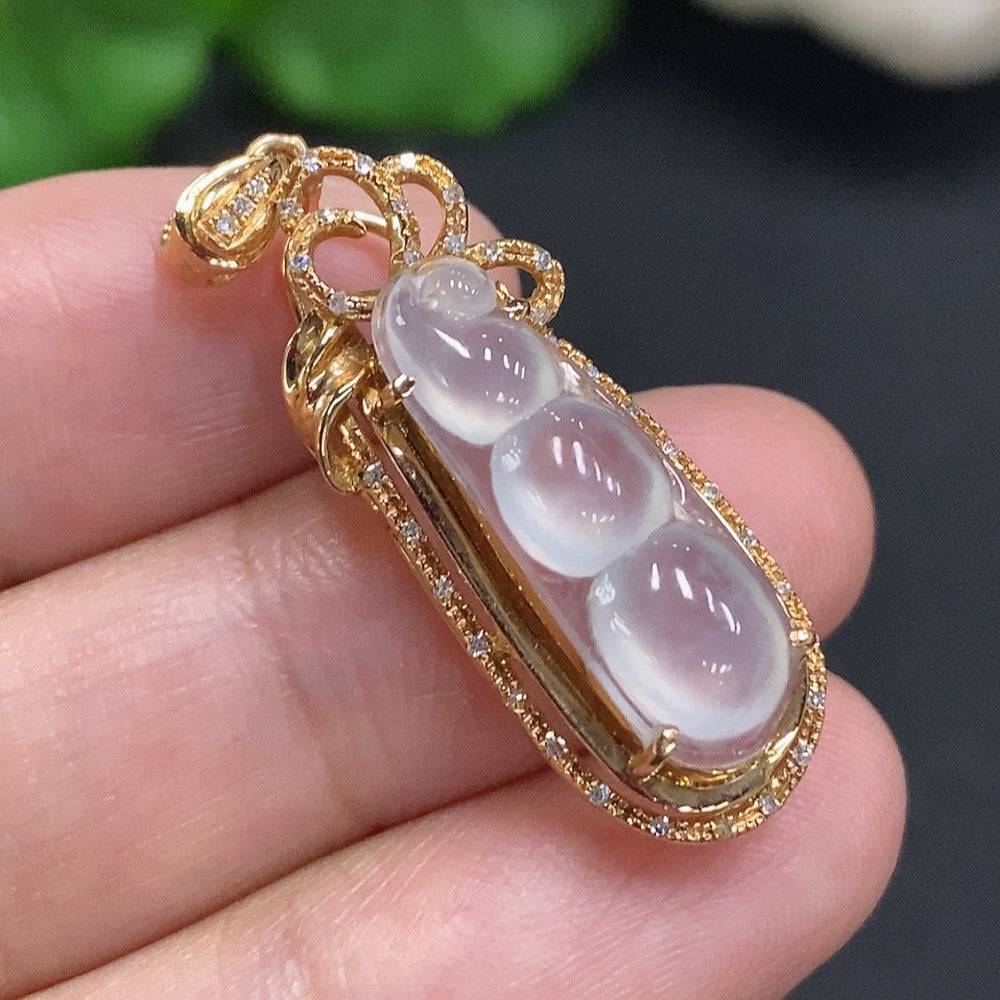 Jadeite lucky bean pendant with 18k gold accents and diamond details, crafted by HUILIU HQ, weighing approximately 3.7 grams.