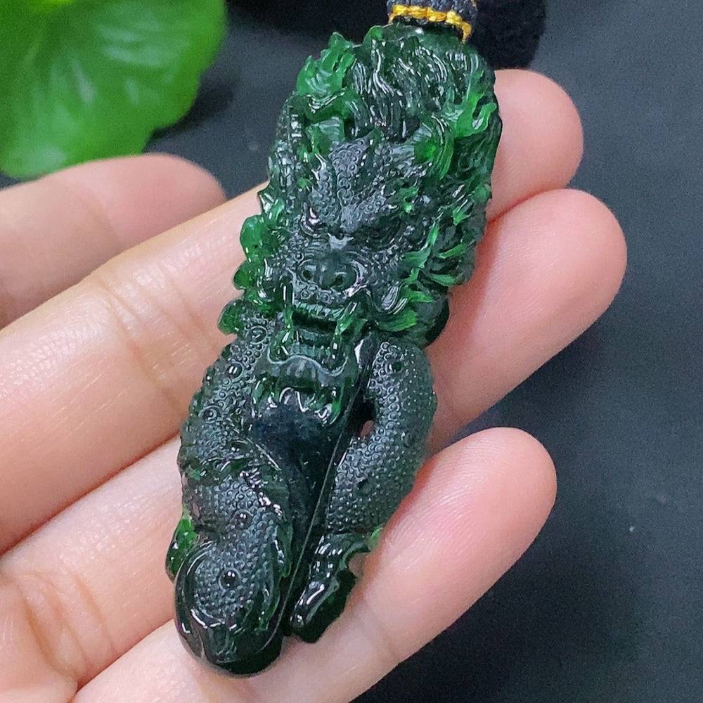 Huiliu Jadeite pendant featuring a carved dragon plaque with rope, showcasing intricate jade craftsmanship.