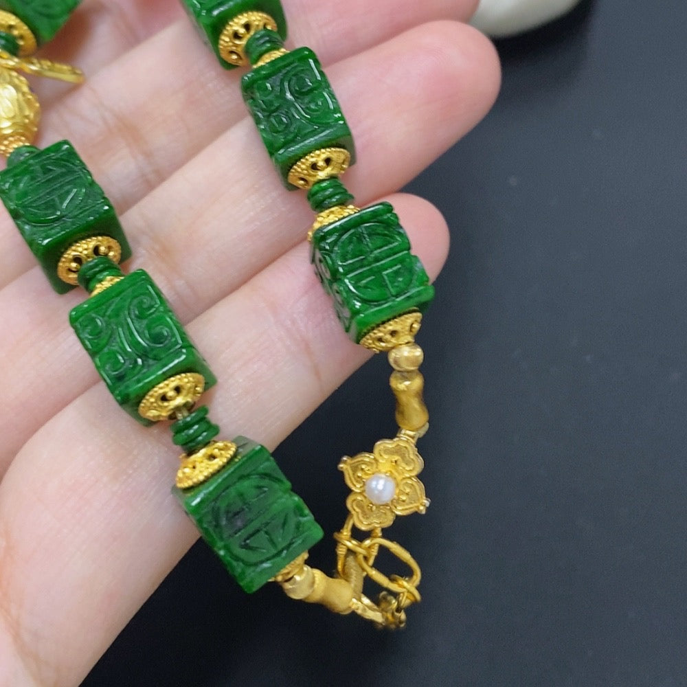 HKHQ jadeite bracelet with mixed minerals, approximately 20g, featuring vibrant green jade stones on a non-gold setting.