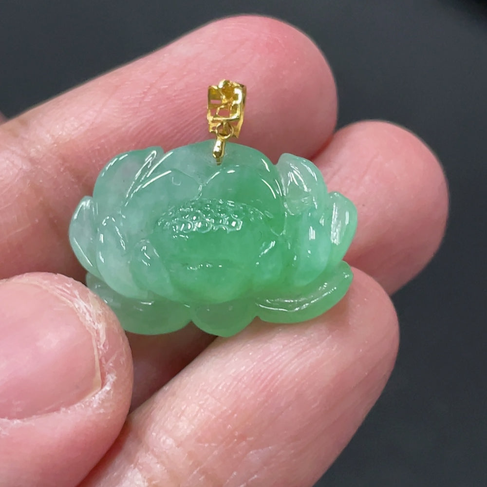 Jadeite lotus pendant with 18k gold clasp, weighs approximately 3.38g, featuring a detailed jade jewelry design.