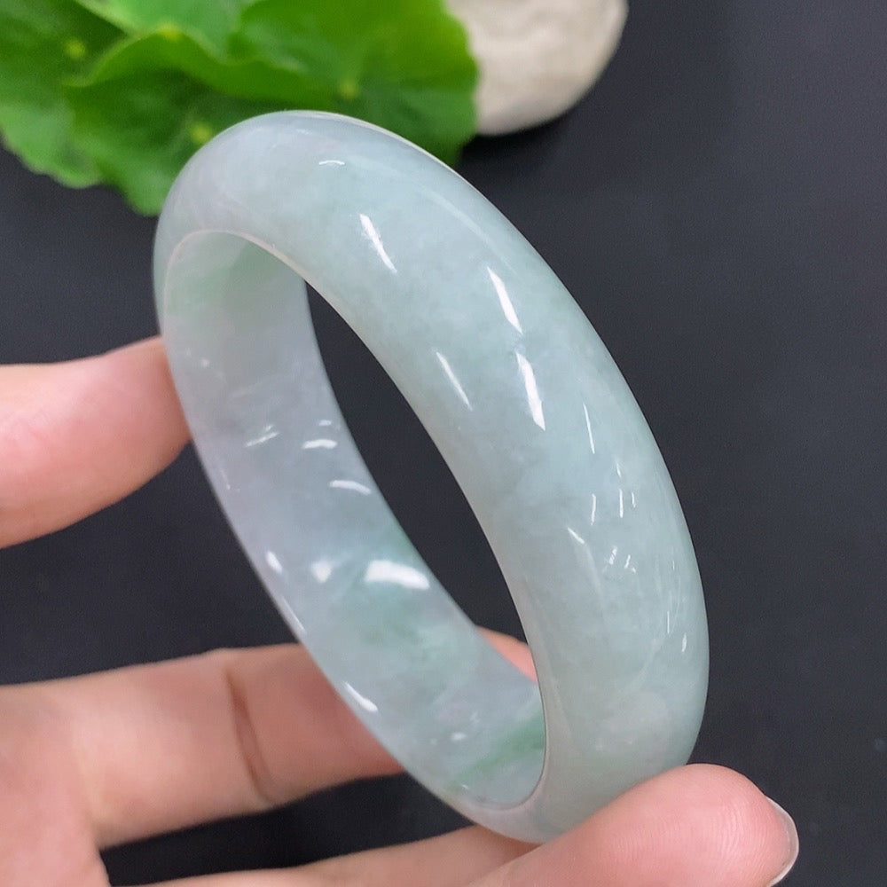 Jadeite round bangle by HKHQ, 64.6g weight, size 54.5, featuring smooth, polished green jade surface.