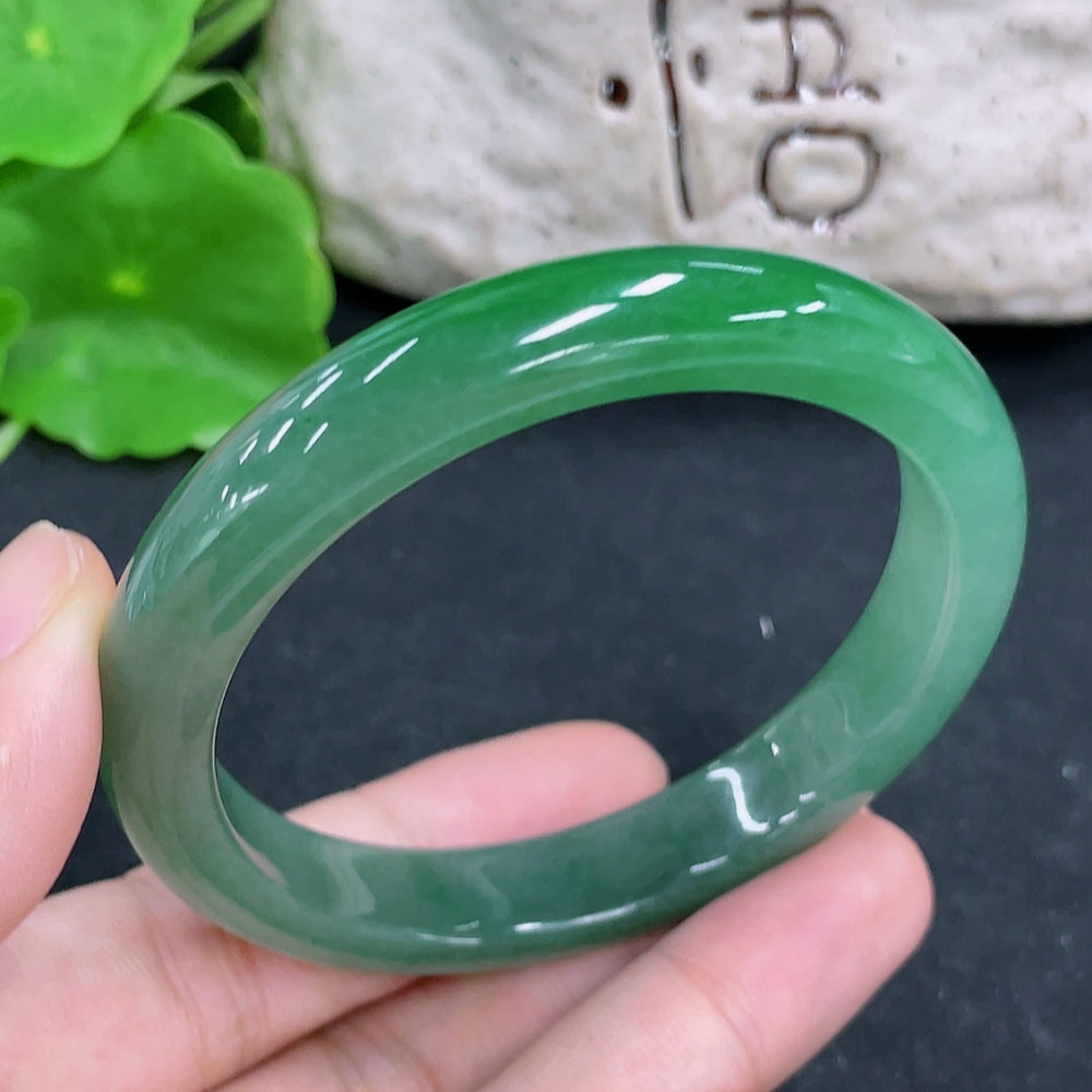 HKHQ jadeite round bangle in size 54, 38.5g, showcasing smooth, polished jadeite bracelet on a neutral background.