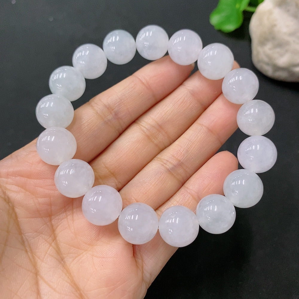 HUILIU HQ jadeite bracelet with 12mm beads, weighing approximately 48.69 grams, featuring smooth, polished green jade stones.