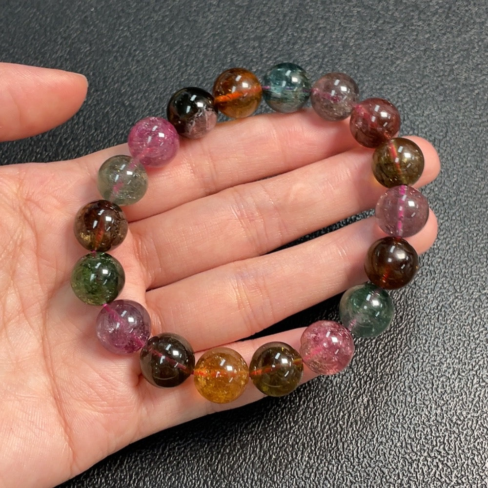 Huiliu gemstone tourmaline bracelet with visible organic matter, 11.7mm size, featuring natural gemstone beads.
