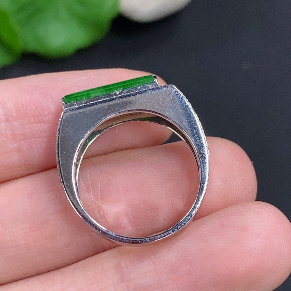 14K gold jadeite cabochon ring with diamond accents, featuring a polished green jade stone set in a delicate gold band.