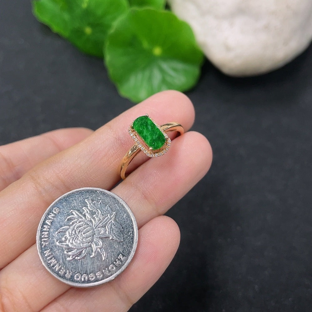 Jadeite and diamond ring in 18k gold, size 14, with sparkling diamonds and smooth jadeite stone, lightweight jewelry accessory.