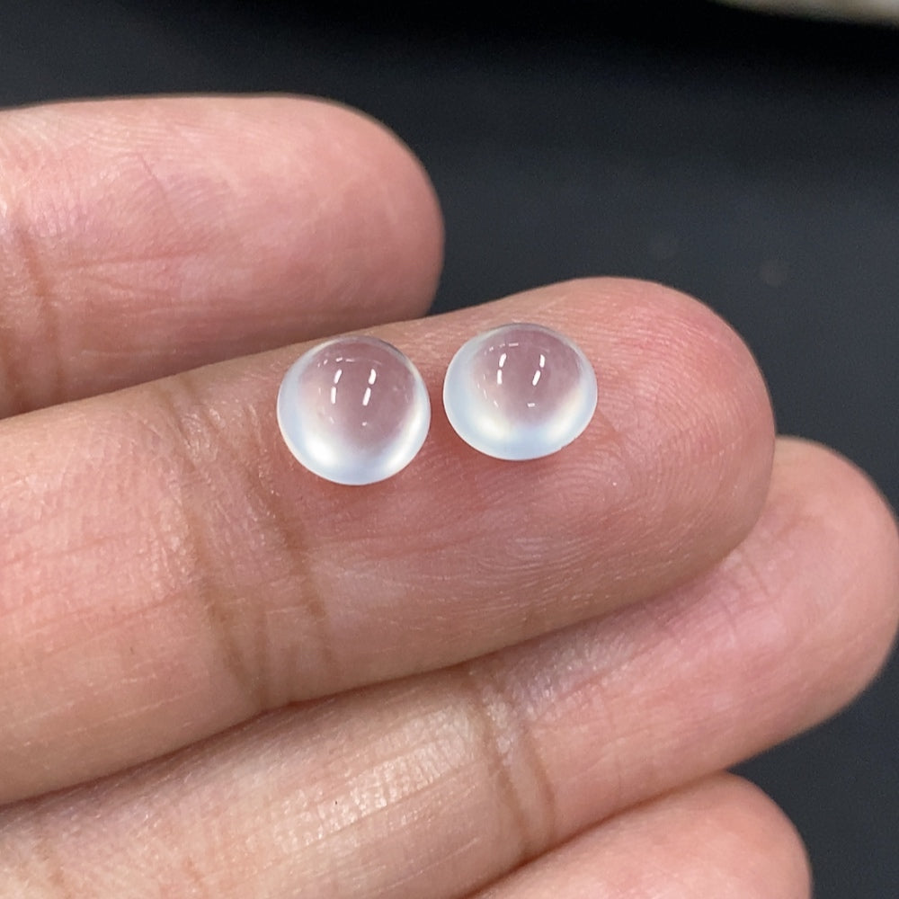 HKHQ jadeite cabochon jewelry piece, 0.49g, showcasing smooth, polished green jadeite gemstone with natural luster and rounded shape.