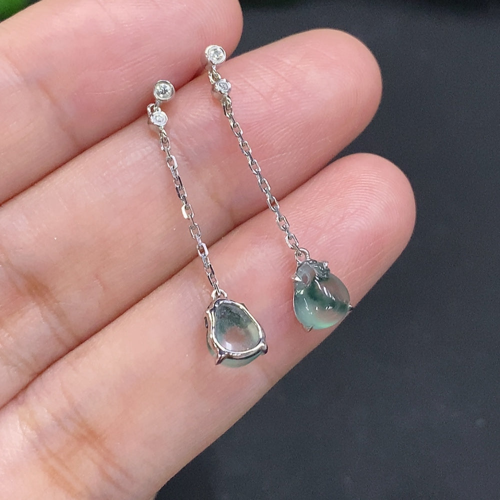 HUILIU HQ jadeite ear studs with diamond accents, 18K gold, featuring smooth green jade stones and intricate gold setting.
