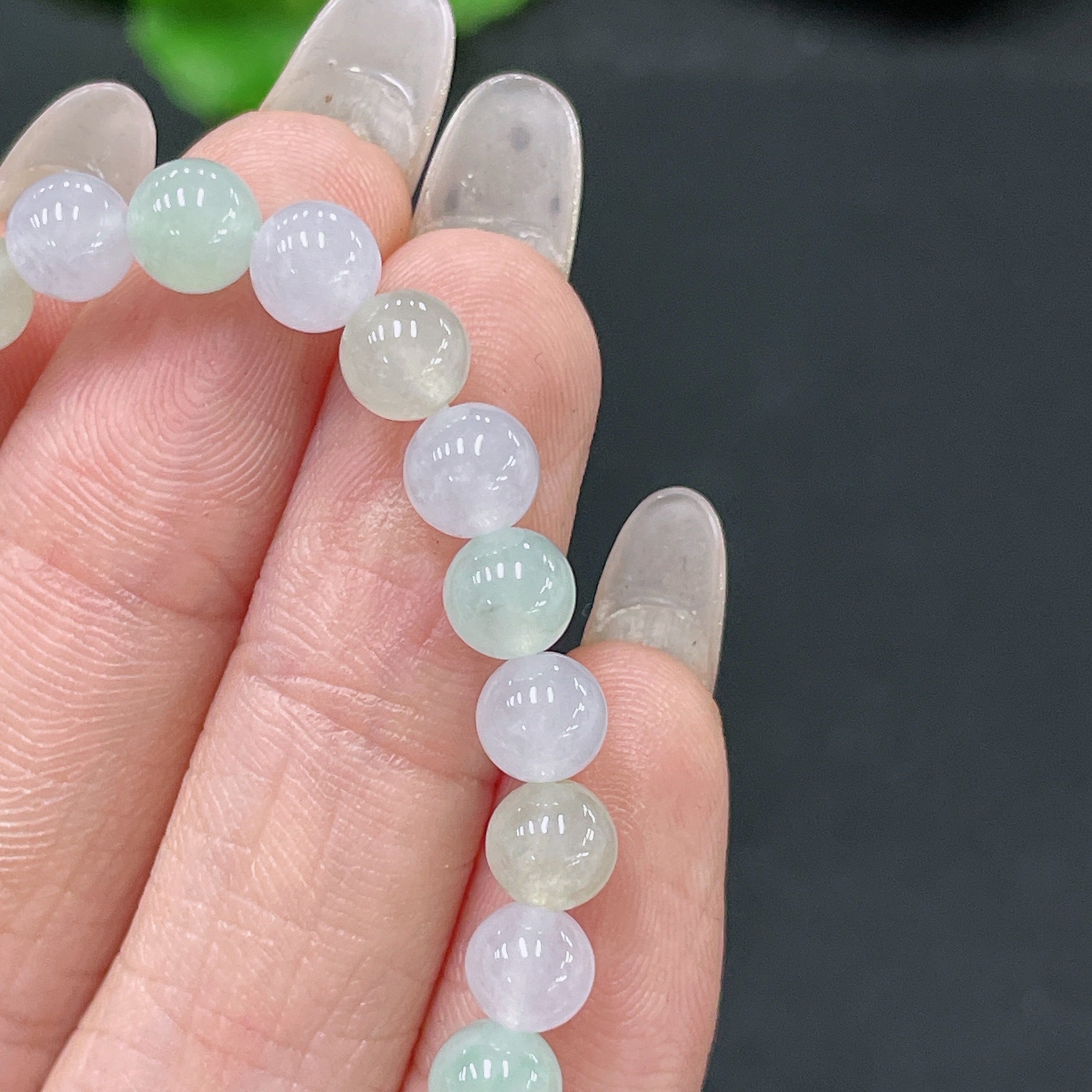 HUILIU HQ jadeite bracelet with 5.6mm beads, total weight approx. 10.12g, showcasing smooth, polished jade jewelry.