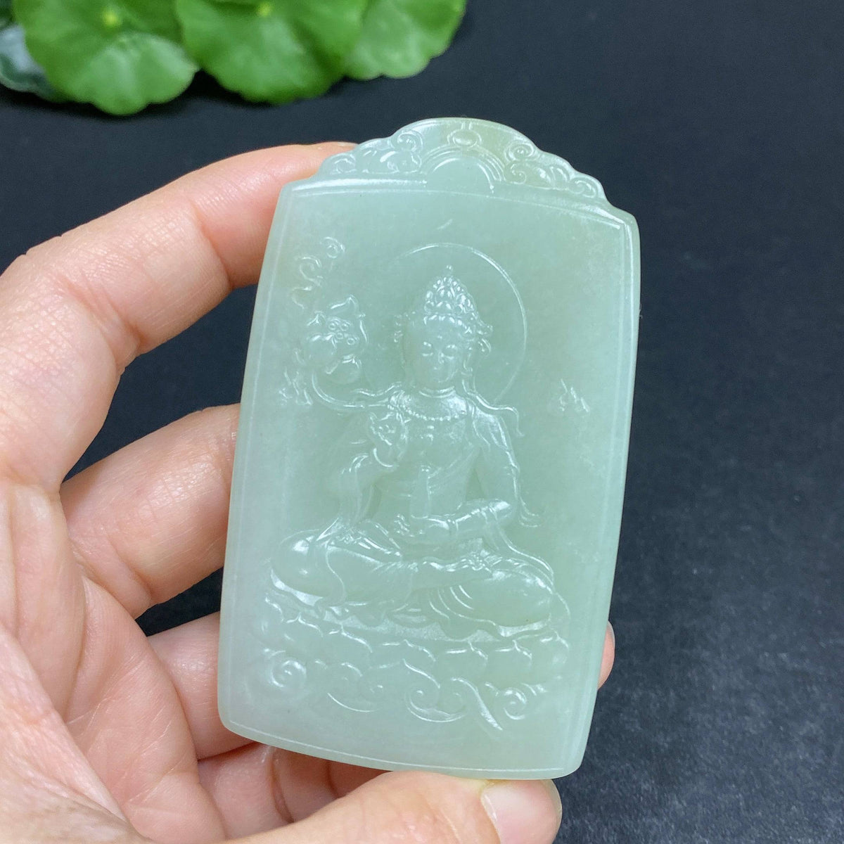 Huiliu Certified Hetian Jade Pendant featuring Guanyin figure, smooth polished jade with intricate carved details.