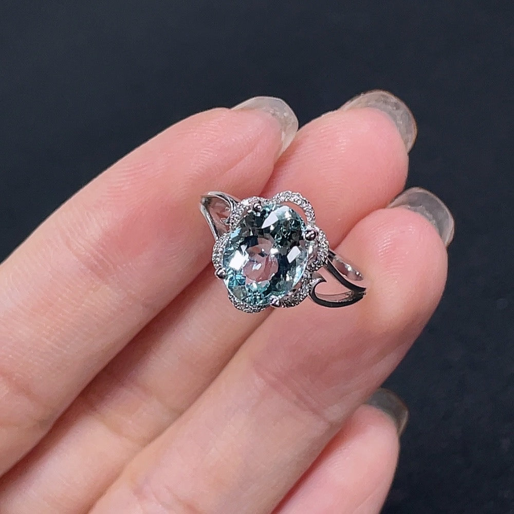 Aquamarine and diamond accent ring in 18K gold, size 14, with a total weight of 3.02g, by HKHQ.