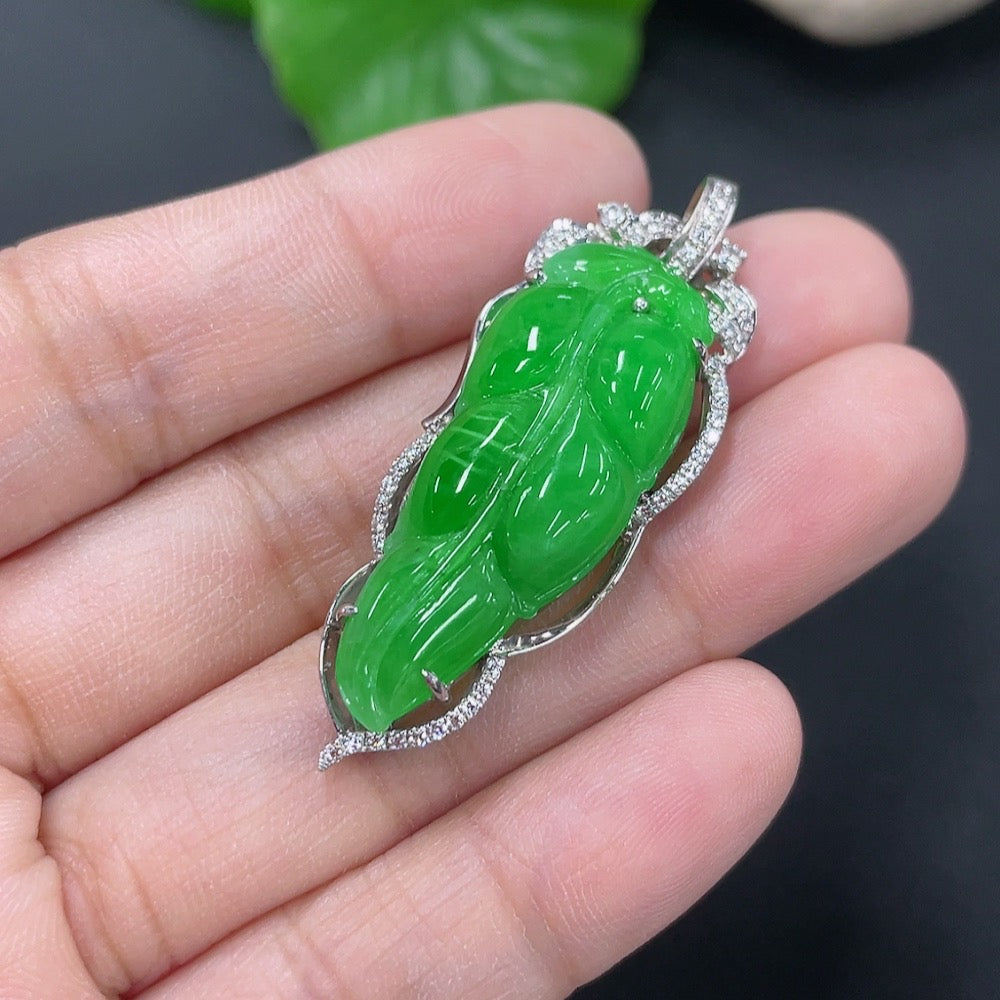 Jadeite leaf pendant necklace with mixed gold components, elegant jewelry piece from HKHQ featuring natural green jadeite.