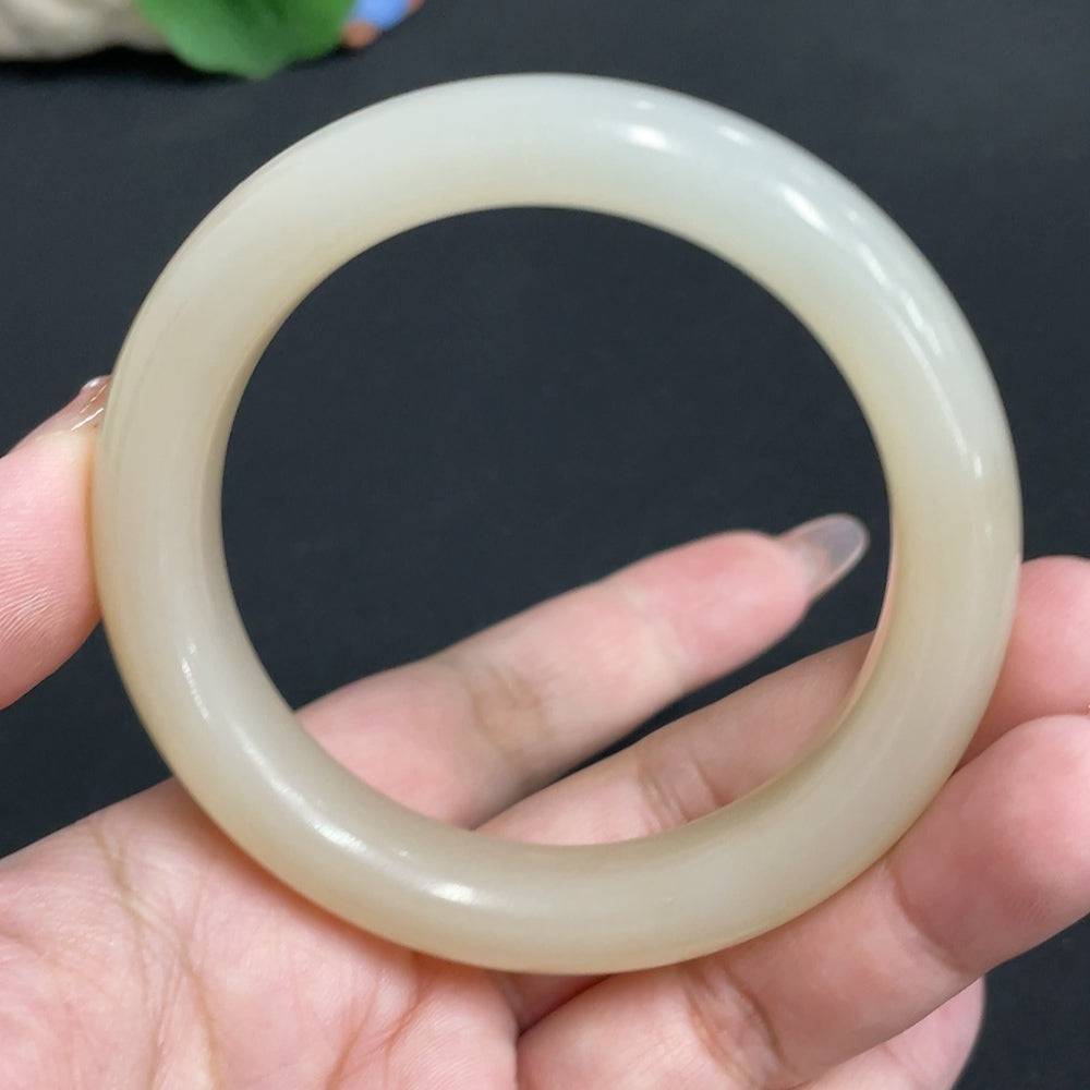 Huiliu HQ Hetian Jade round bracelet with digital collection certificate, showcasing smooth, polished jade beads.