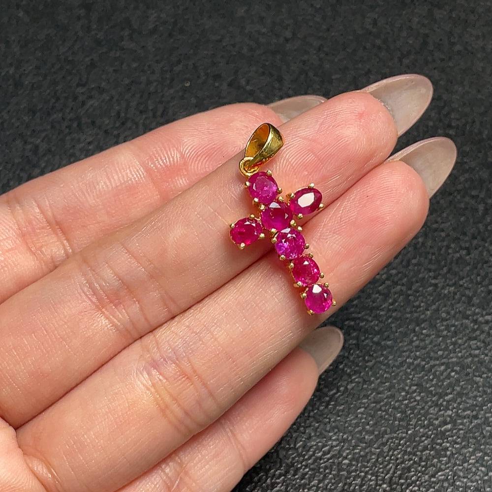 Gold content ruby pendant with a 3.8x3.1mm gemstone, weighing approximately 2.83g, featuring a polished gold chain and setting.