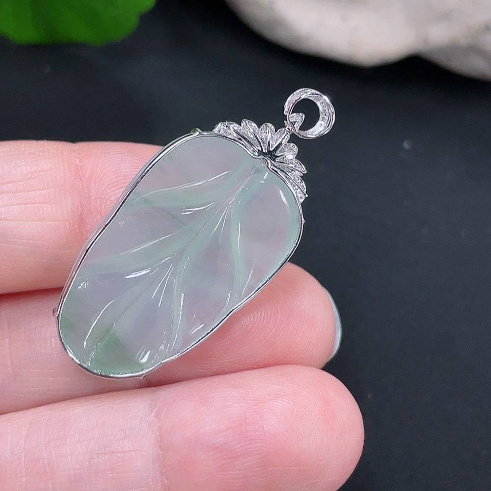 HUILIU HQ jadeite pendant shaped like a leaf with diamond accents, 18k gold setting, weighs approximately 4.34 grams.