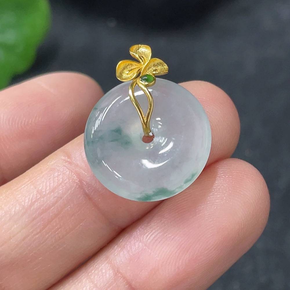 Jadeite peace knot pendant with 18k gold clasp, crafted from green jade, weighs approximately 2.74 grams, by HUILIU HQ.