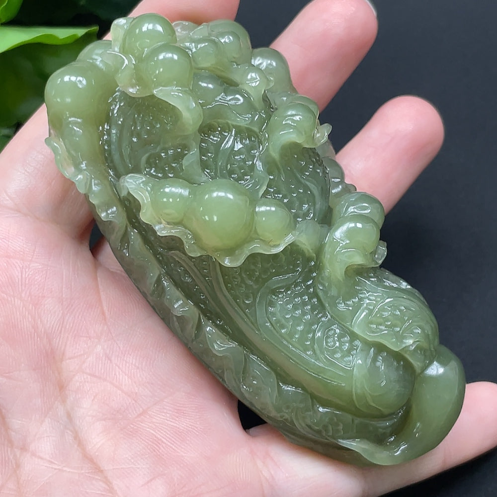 Hetian Jade Cabbage pendant necklace by HKHQ featuring a detailed green jade cabbage pendant on a silver chain.