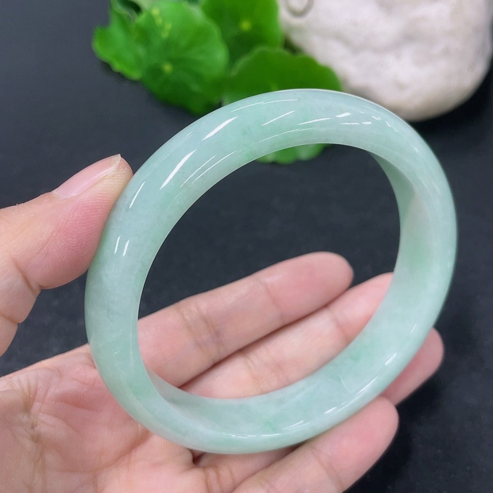 Jadeite round bracelet with 58mm diameter, weighing approximately 54.45g, crafted by HKHQ, featuring smooth green jade stones.
