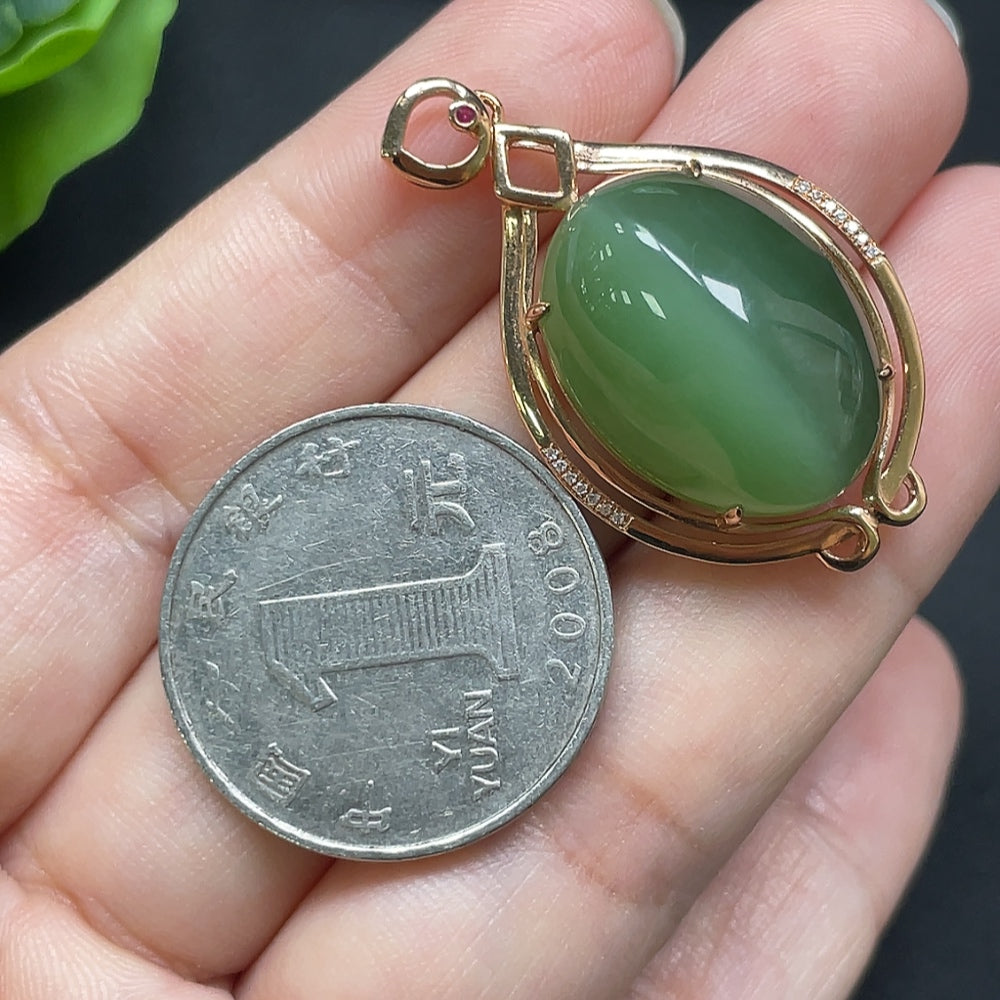 Hetian Jade inlaid cabochon pendant, 18K gold with diamond accents