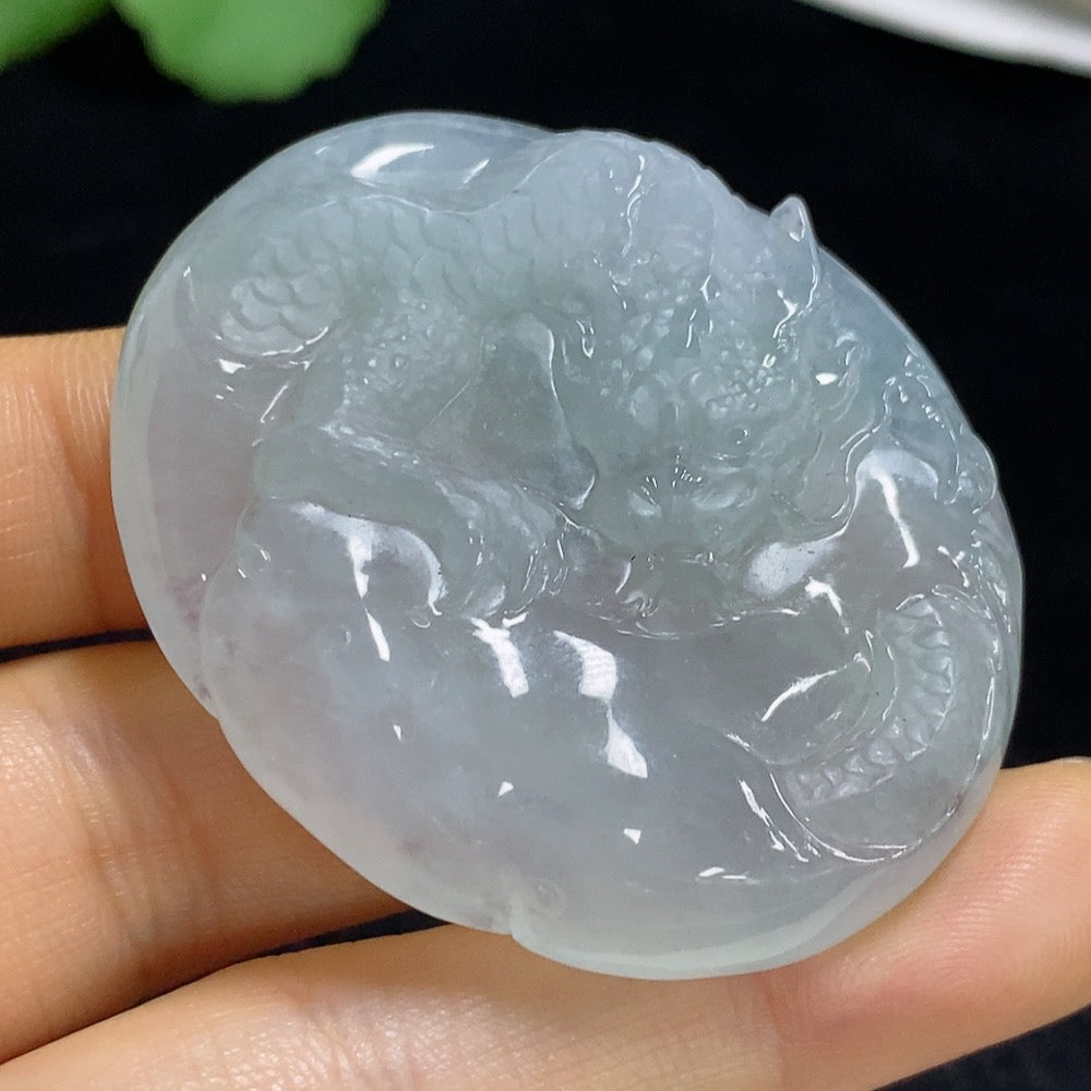 HUILIU HQ jadeite pendant featuring a detailed dragon design, weighing approximately 33.56 grams, with vibrant green jade color.