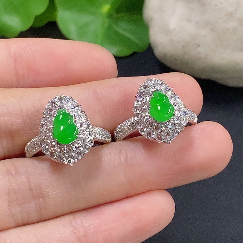 Jadeite gourd inlaid ring in 18k gold with diamond accents, size 14, from HKHQ, showing intricate design and polished finish.