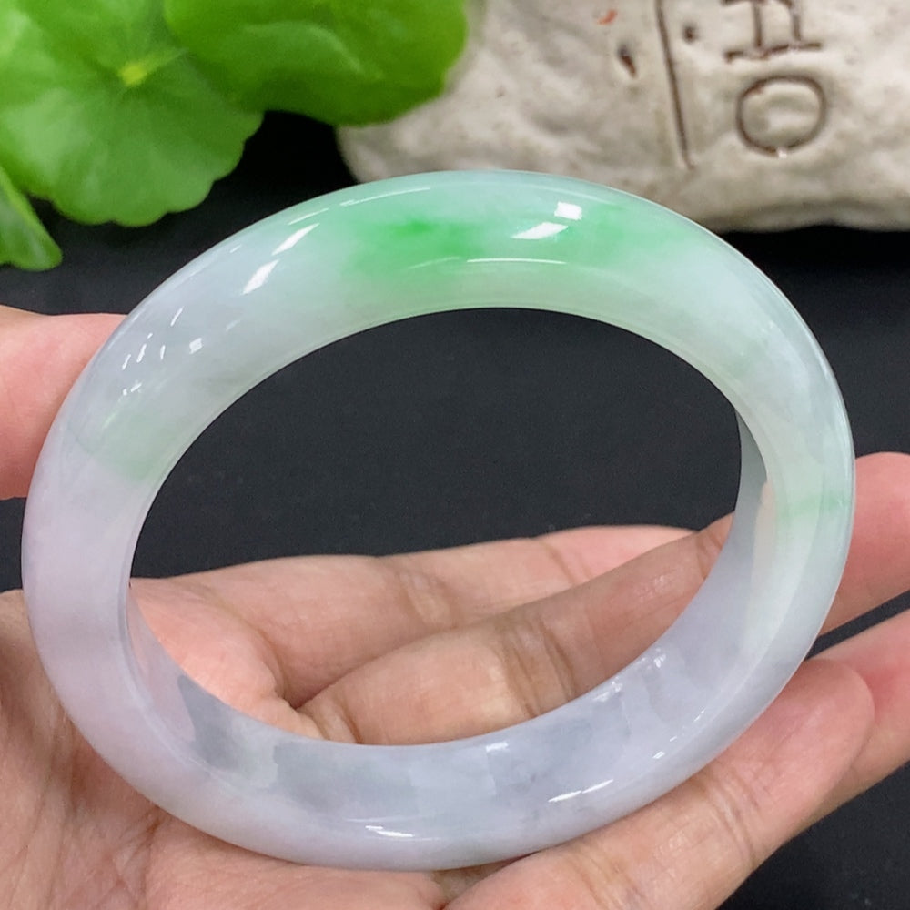 HKHQ jadeite round bangle with size 57.1 and weight 64.6g, showcasing smooth, polished green jadeite bracelet.