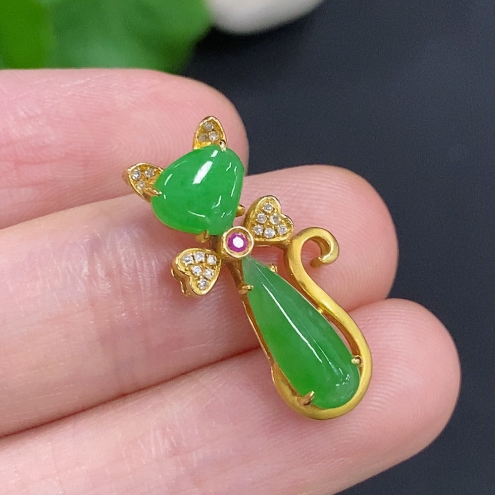 Jadeite pendant with diamond accents on 18K gold necklace, elegant jewelry piece with detailed craftsmanship.