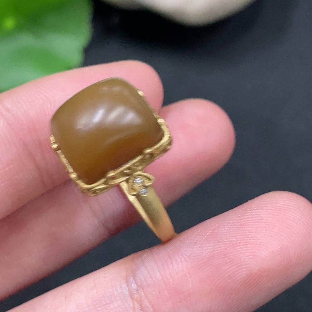 Hetian jade open-ended ring by HUILIU HQ with 18k gold accents and diamond details, showcasing a smooth jade band.