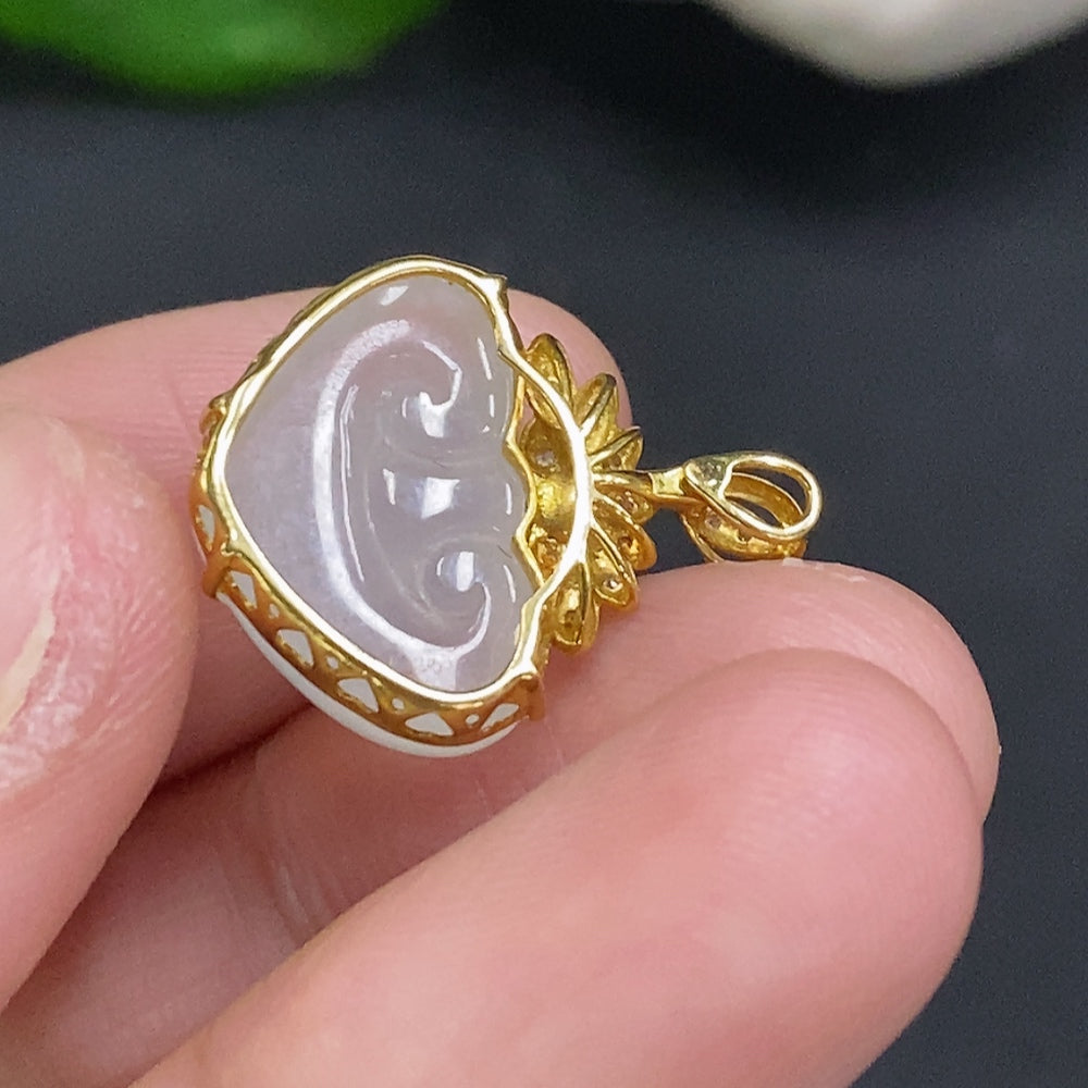 Huiliu Jadeite Ruyi pendant with diamond accents, inlaid design, showcasing intricate craftsmanship and elegant jade jewelry.