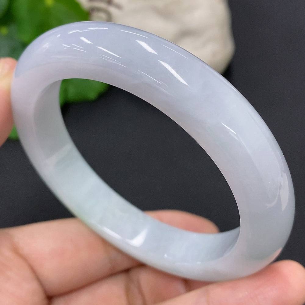 HUILIU HQ jadeite round bangle, size 56, weighing approx. 63.1g, showcasing smooth, polished green jade surface.