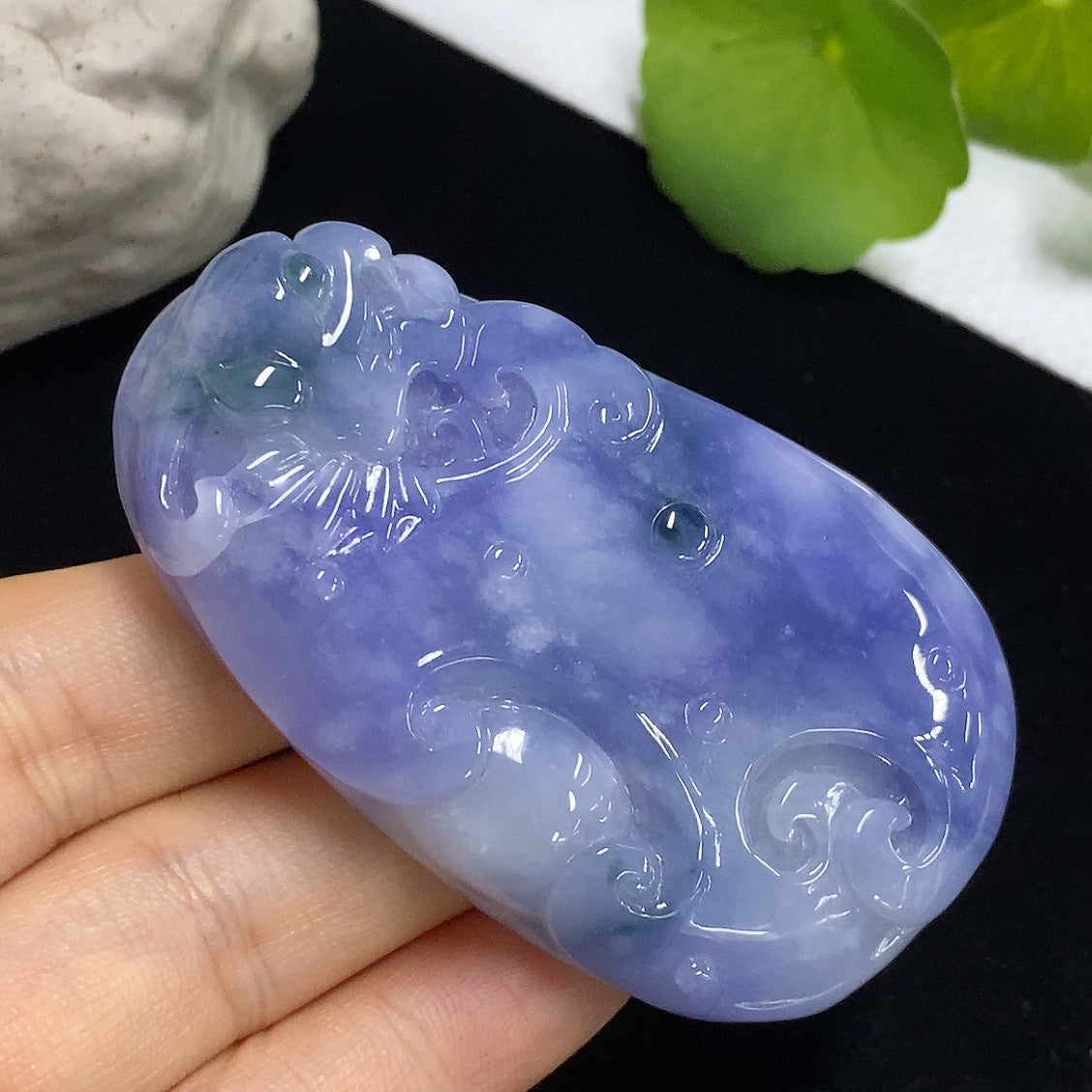 Jadeite Ruyi pendant with intricate carvings, polished jade surface, and a total weight of approximately 60.49 grams.