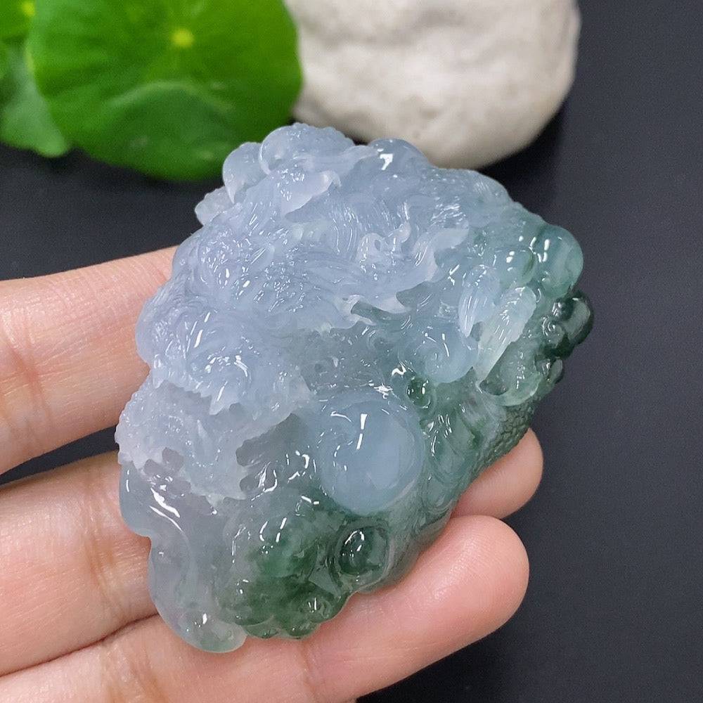 Jadeite pendant featuring a carved dragon plaque, weighing approximately 67g, crafted by HUILIU HQ in smooth green jade.