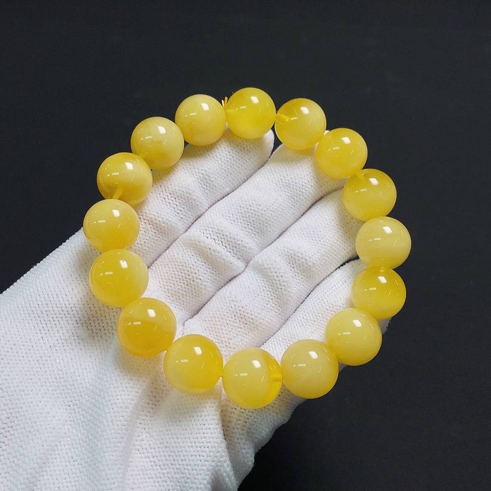 Amber Beeswax Bracelet by HUILIU HQ featuring 13.2mm amber beads with a total weight of 20.9g, natural and handcrafted jewelry.