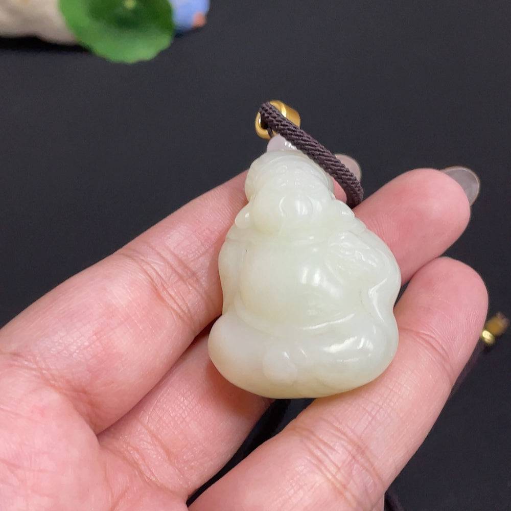 Hetian jade pendant featuring the God of Wealth, weighing approximately 34.8g, crafted by HUILIU HQ with a jade rope.