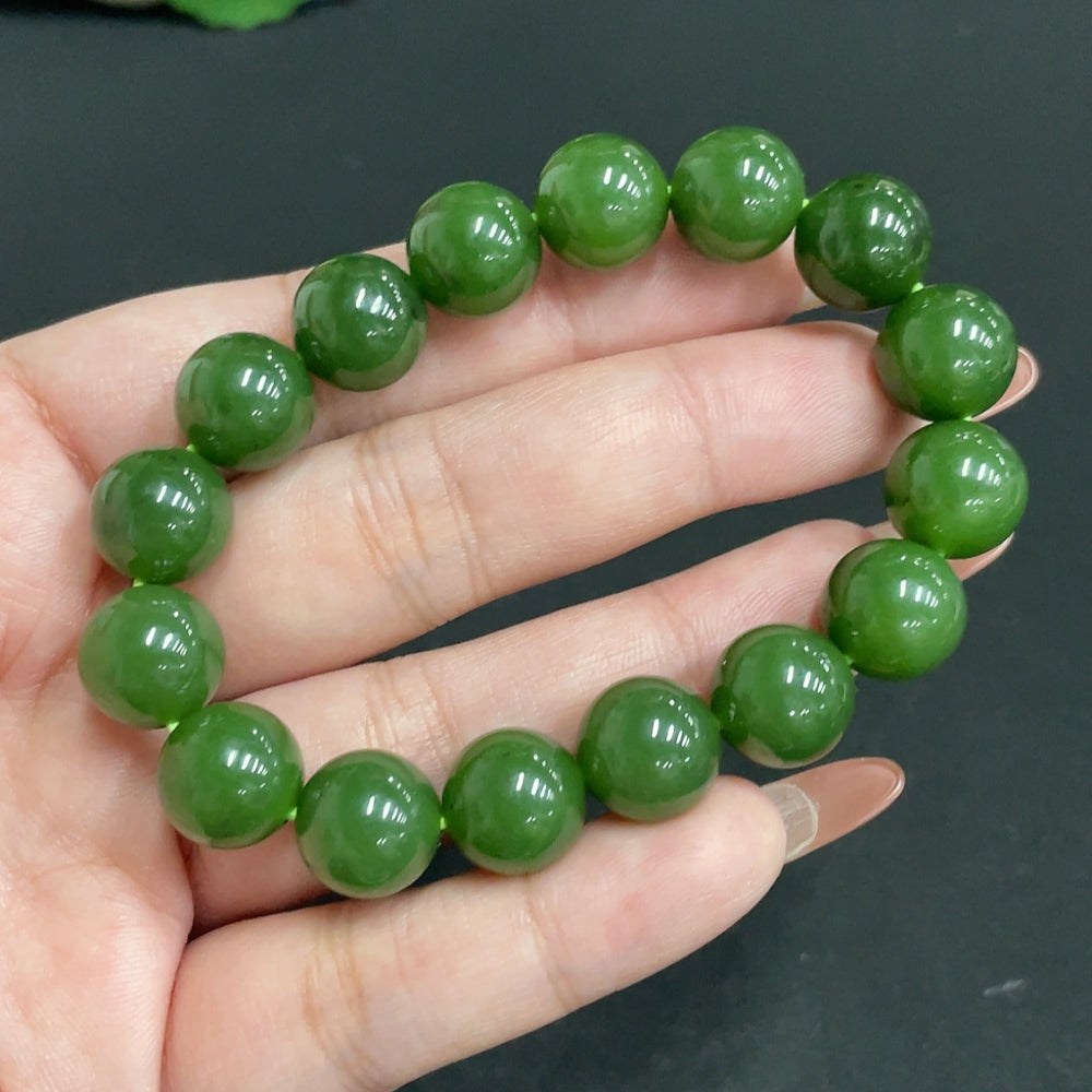 Hetian Jade Jasper bracelet with 11.5mm beads, weighing approximately 41.6g, featuring smooth, polished jade stones.