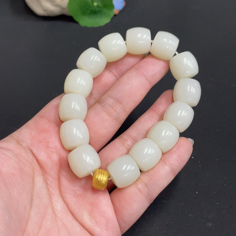 Hetian jade bracelet with 14.8mm beads, 83g weight, 18k gold content, no hallmark, by HUILIU HQ, showcases smooth jade stones.