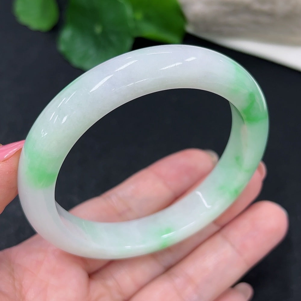 HKHQ jadeite round bangle, size 56, 51.3g, showcasing smooth, polished jadeite with a rounded shape and vibrant green hue.