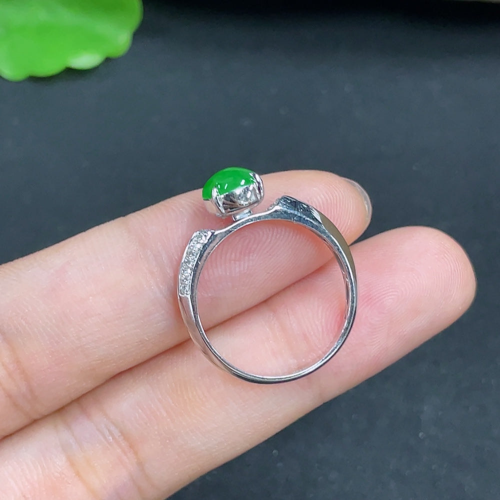 Jadeite ring by HKHQ featuring 18k gold with diamond accents, size 13, showing the shank and natural jadeite beneath.