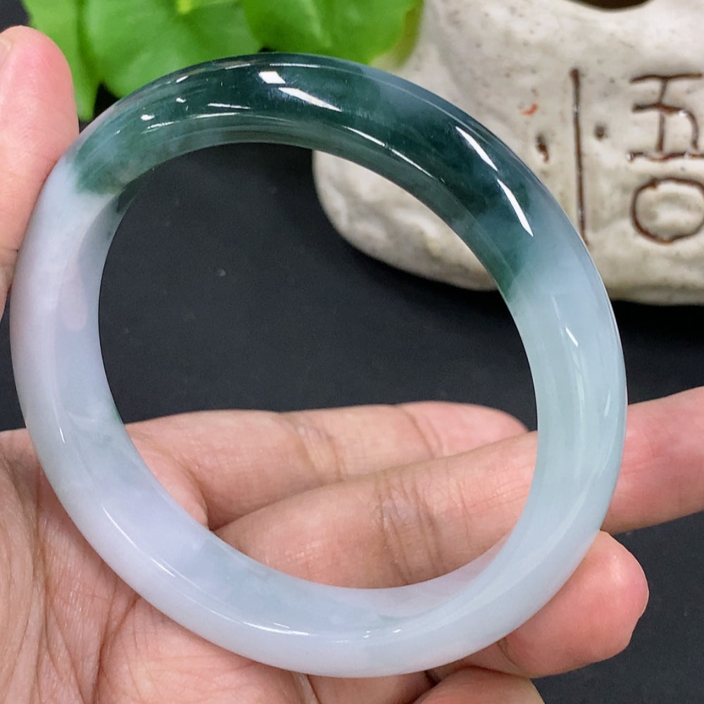 HKHQ jadeite round bangle bracelet, 55.5mm size, approximately 51.68g, smooth circular design in vibrant green jadeite.