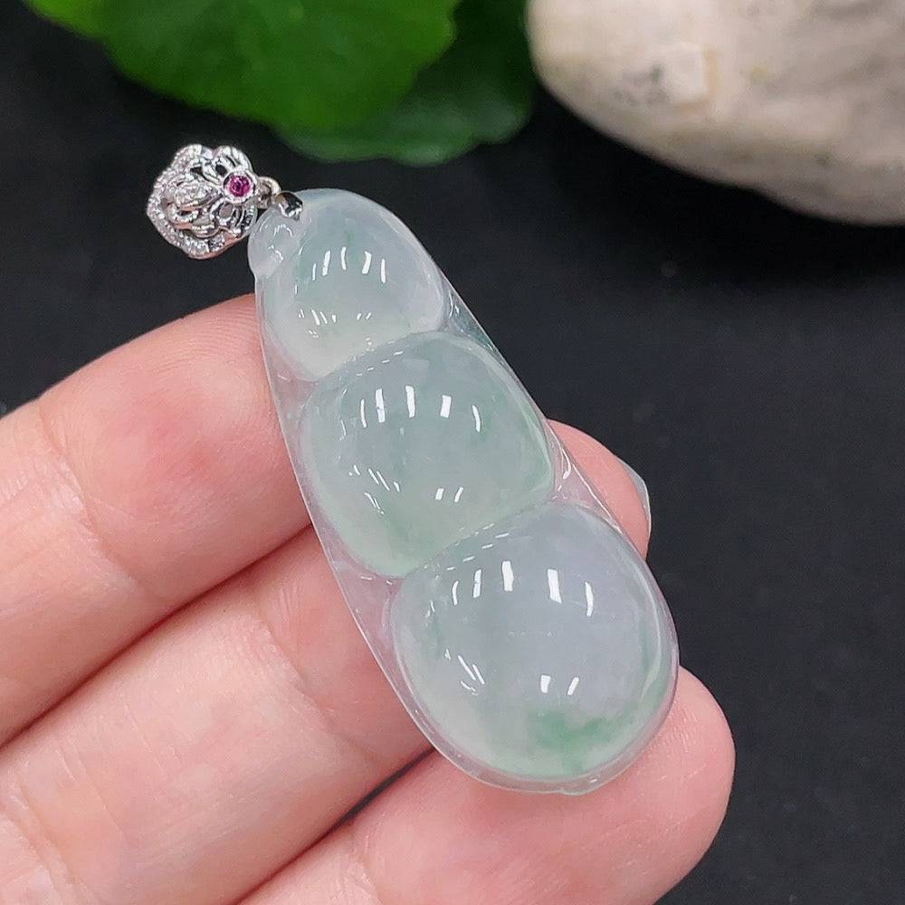Jadeite lucky bean pendant with diamond accents in 18K gold, crafted by HUILIU HQ, weighing approximately 6.1 grams.