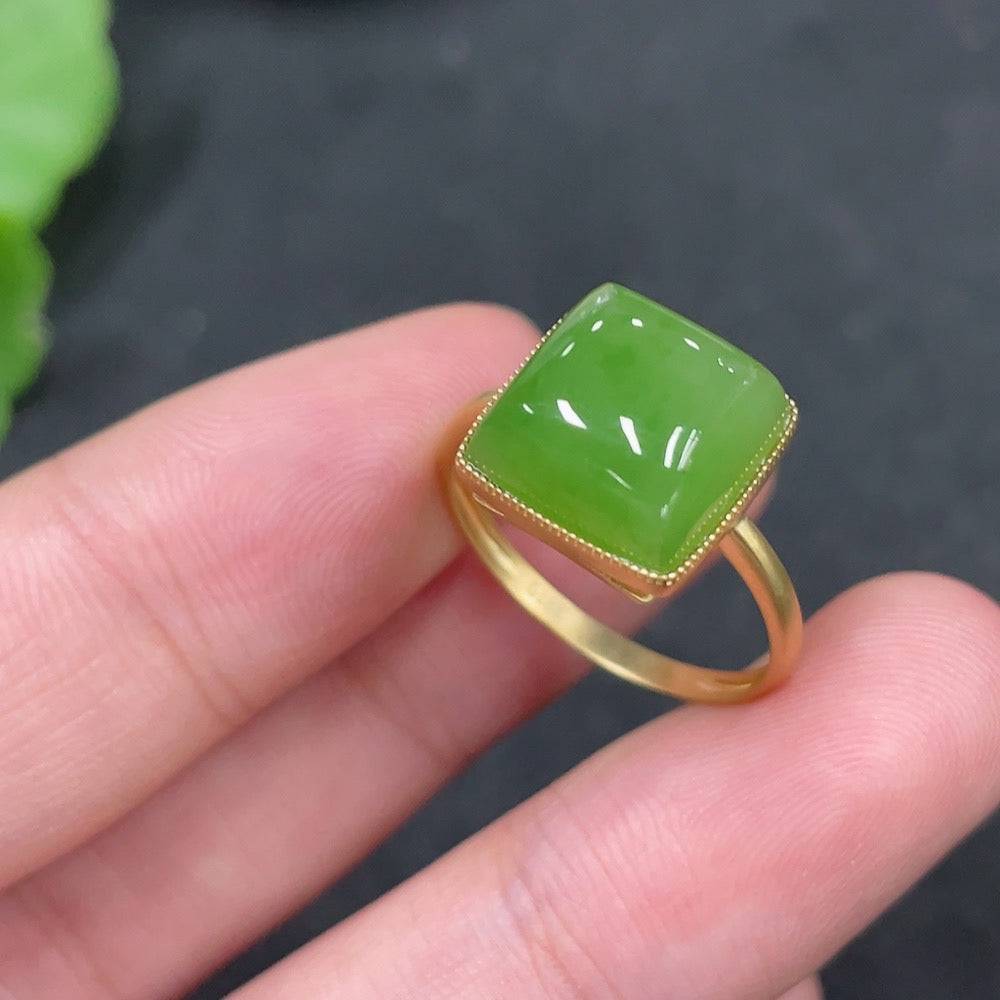 Huiliu HQ Hetian jade inlaid ring featuring a polished jade gemstone and intricate silver band.