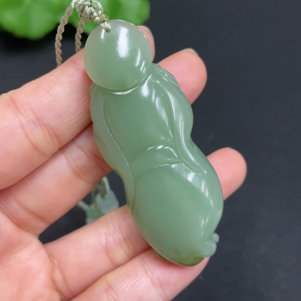 Hetian Jade Jasper Buddha pendant with rope and non-Hetian Jade beads, HUILIU HQ certified, showcasing intricate carved details.