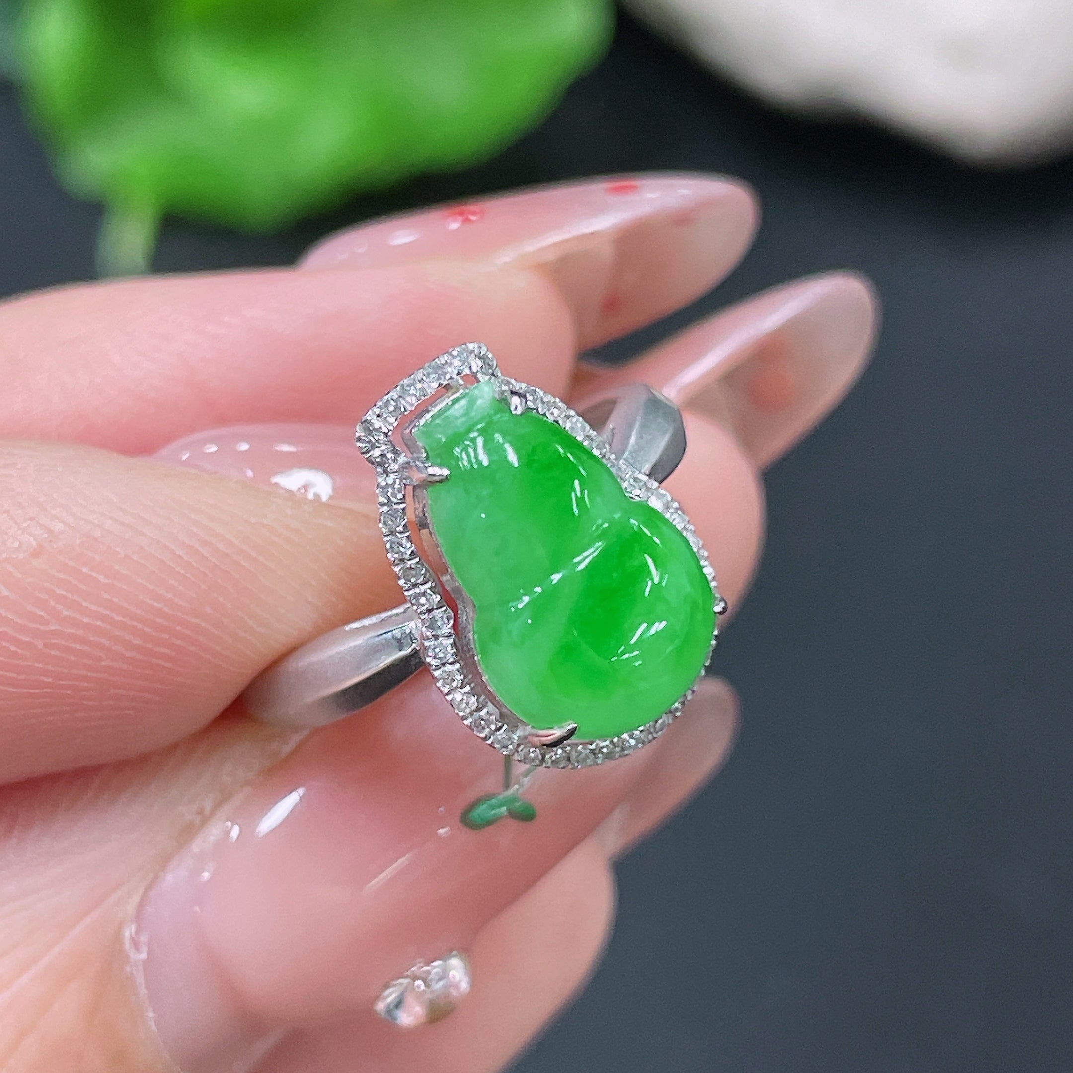 Jadeite ring set with 18k gold and diamonds, size 11, featuring a polished jade gemstone and intricate gold detailing.