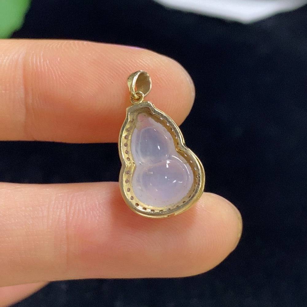 Huiliu Jadeite gourd inlaid pendant featuring intricate craftsmanship and vibrant green jade, certified by Huiliu HQ.