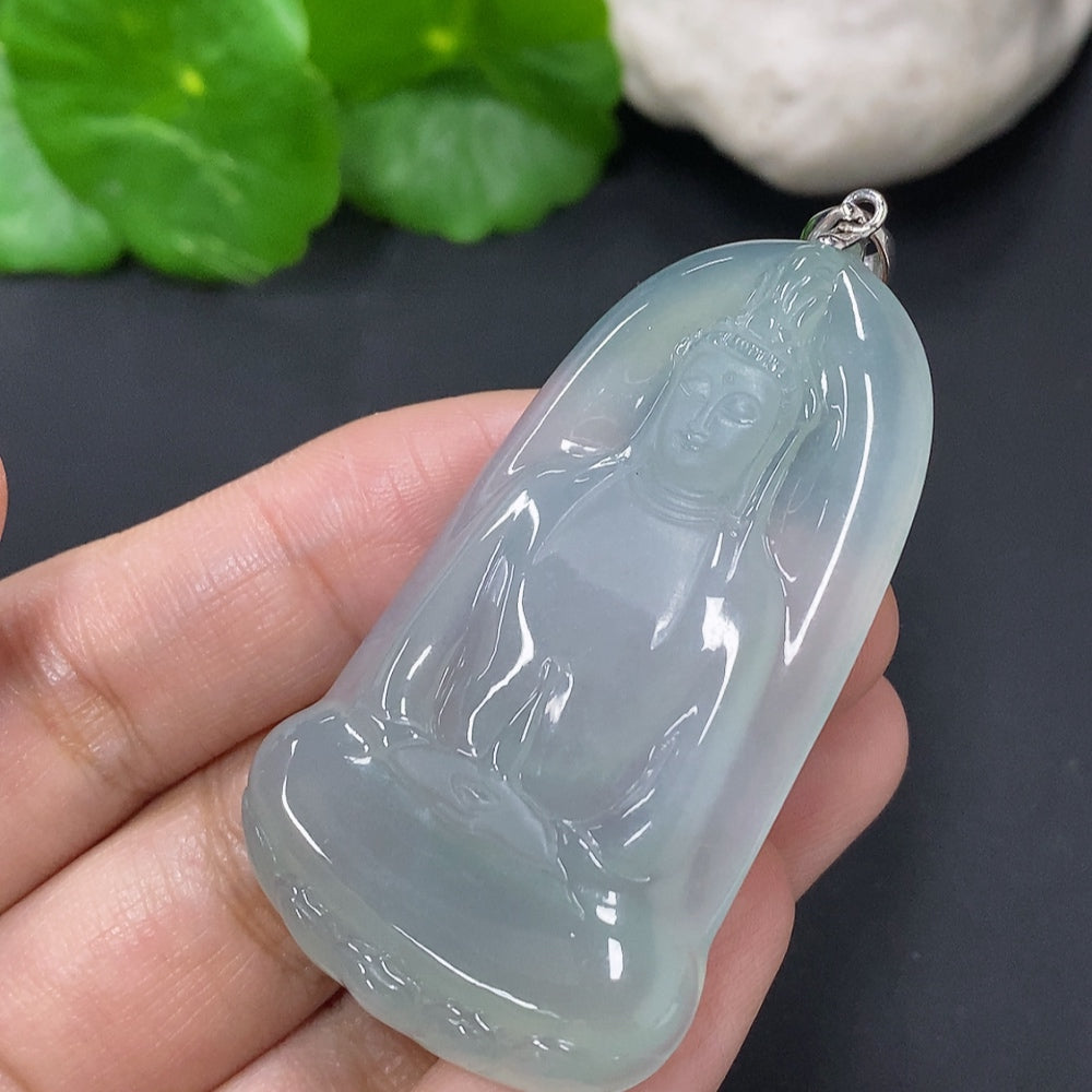 Huiliu Jadeite Guanyin pendant featuring intricate carving, certified quality, and a smooth polished surface.