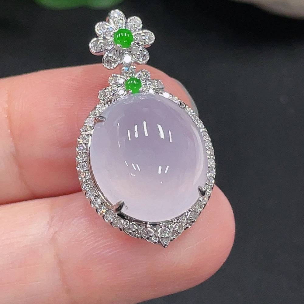 Jadeite pendant with 18K gold setting and diamond accents, crafted by HUILIU HQ, showcasing a polished jade stone.