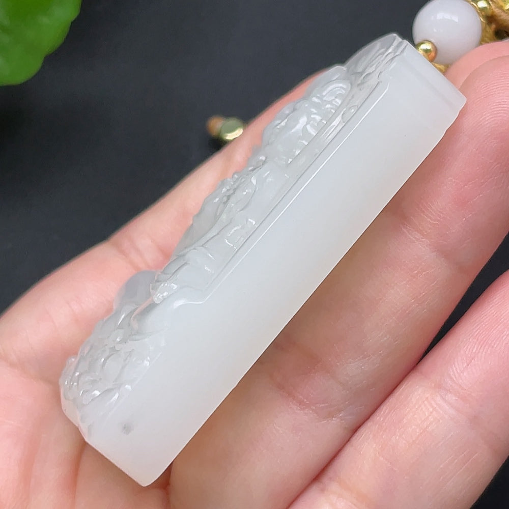 HKHQ Hetian Jade Guanyin pendant necklace with rope, weighing approximately 71.37g, featuring intricate carved jade design.