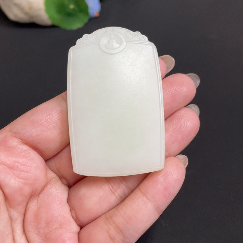 Huiliu certified Hetian jade pendant with plain design, showcasing smooth, polished jade stone on a neutral background.